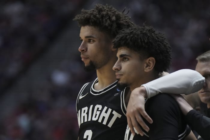 Wright State Raiders guard Tanner Holden (2) and guard Trey Calvin (1) react against the Arizona Wildcats during the second half during the first round of the 2022 NCAA Tournament at Viejas Arena.